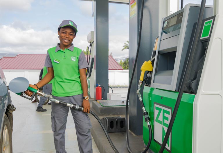 ZEN pump attendant helping customer to refuel